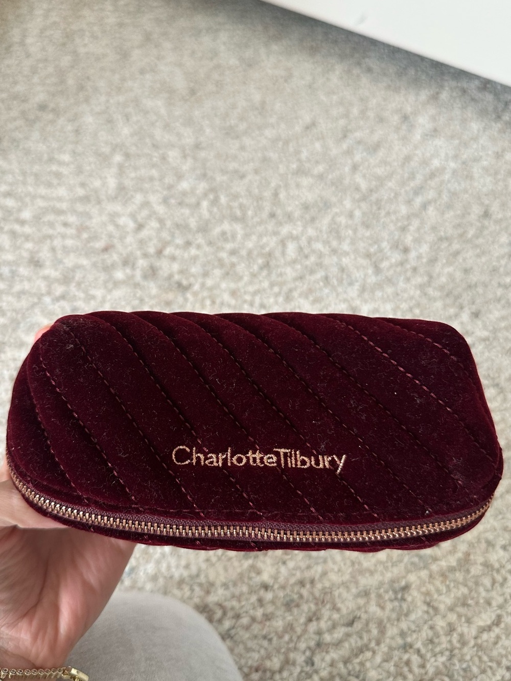 Charlotte Tilbury Quilted Velvet Cosmetic Case in Burgundy with Gold CT Logo - Picture 2 of 3